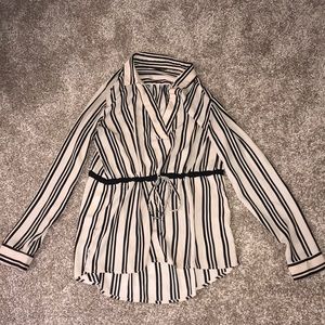 Pale pink and black blouse